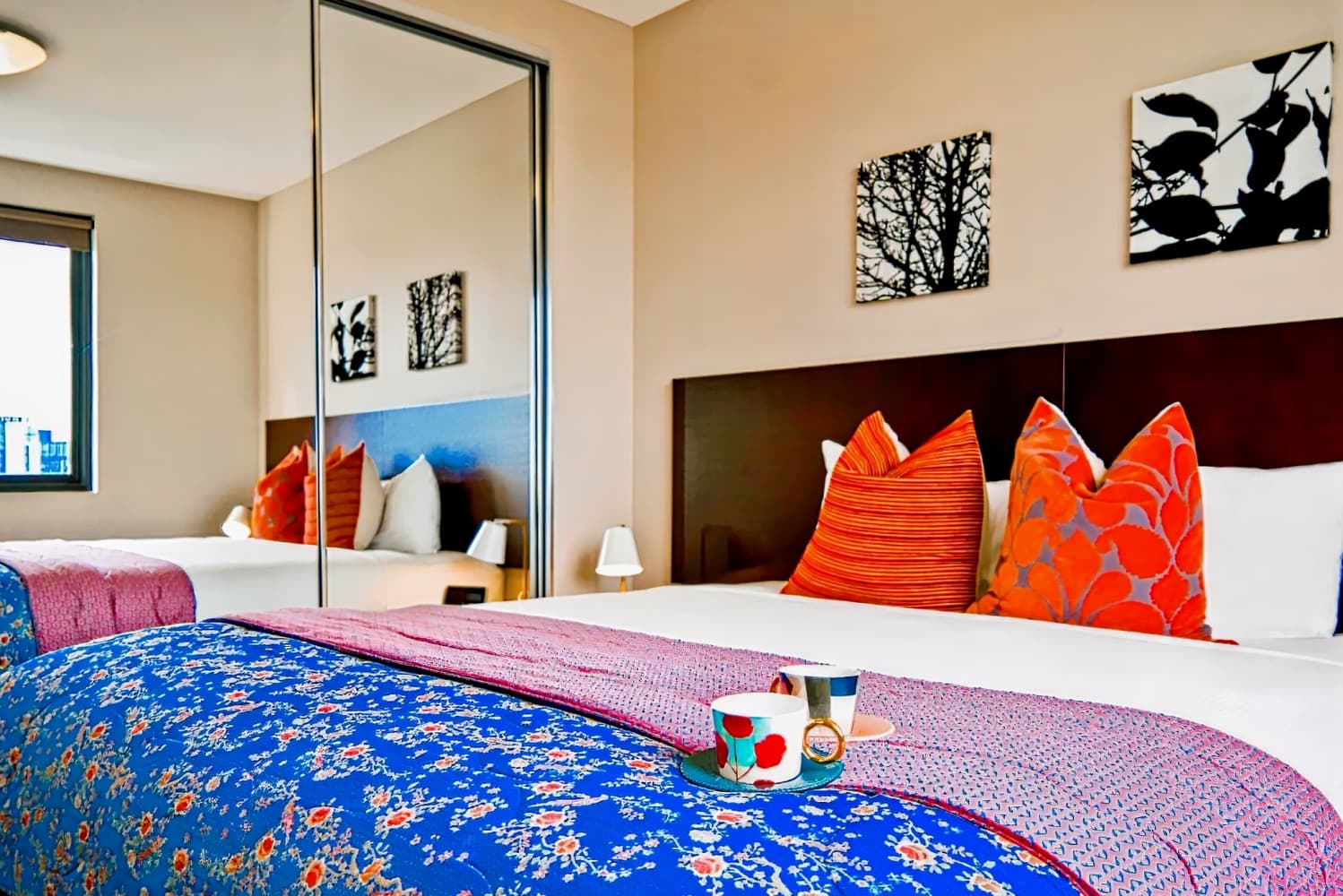 Quest Serviced Apartments Mascot
